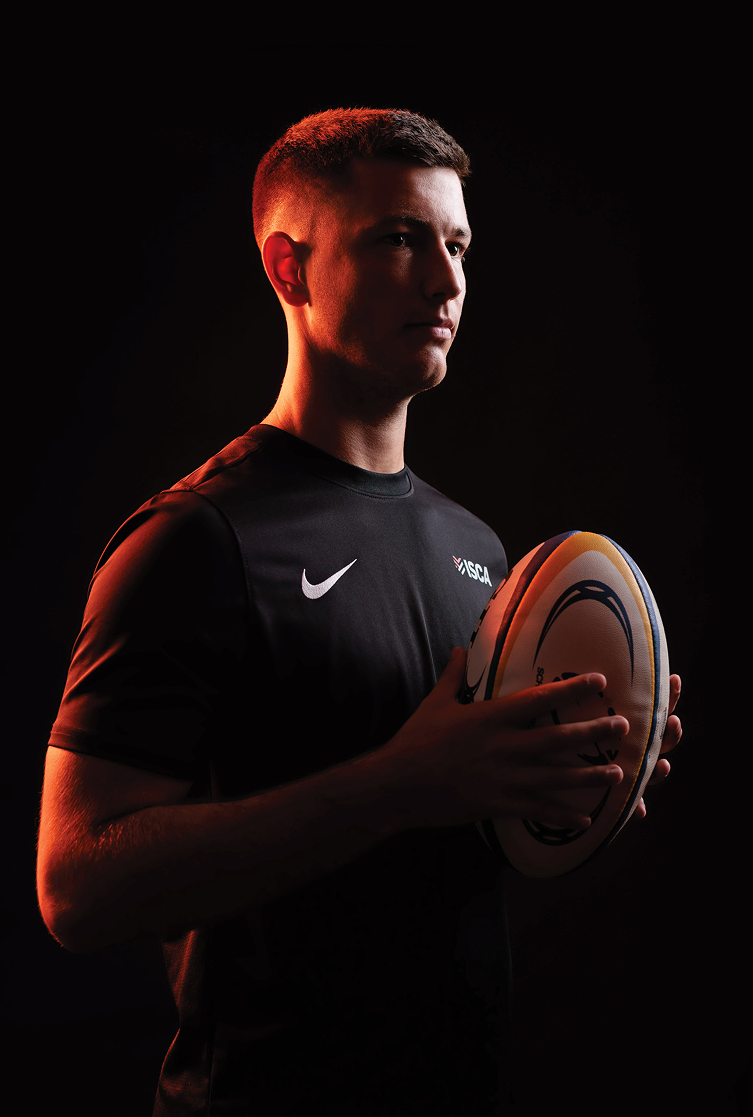 Student Holding Ball