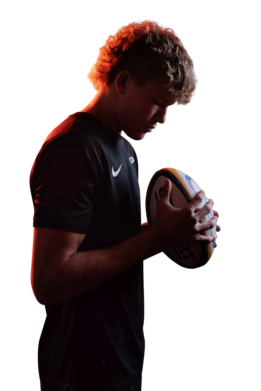 Student holding football